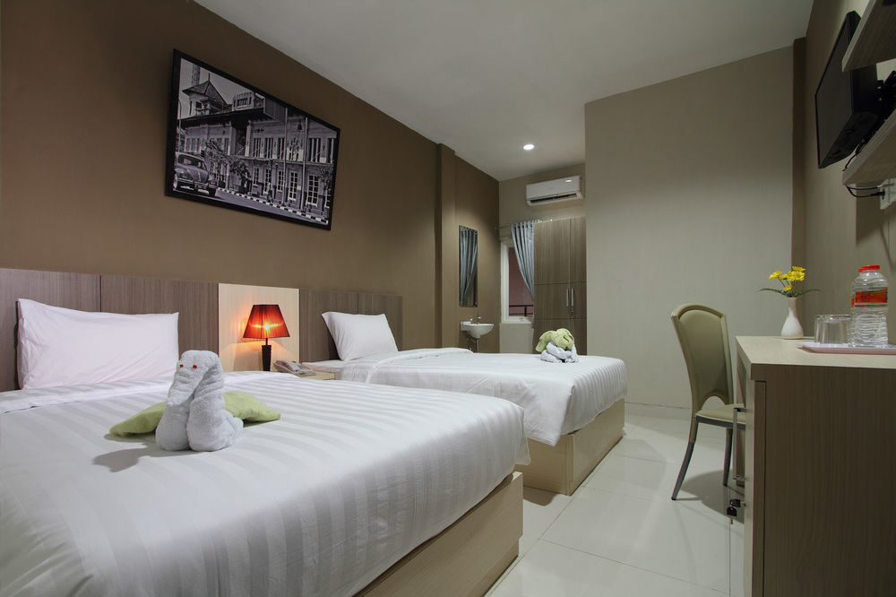 Oyo Flagship 3726 Tembok Batu Residence Tugu Exterior photo